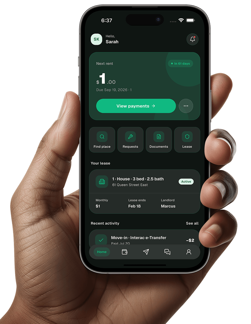 Hand holding a phone showing the Ternah tenant app